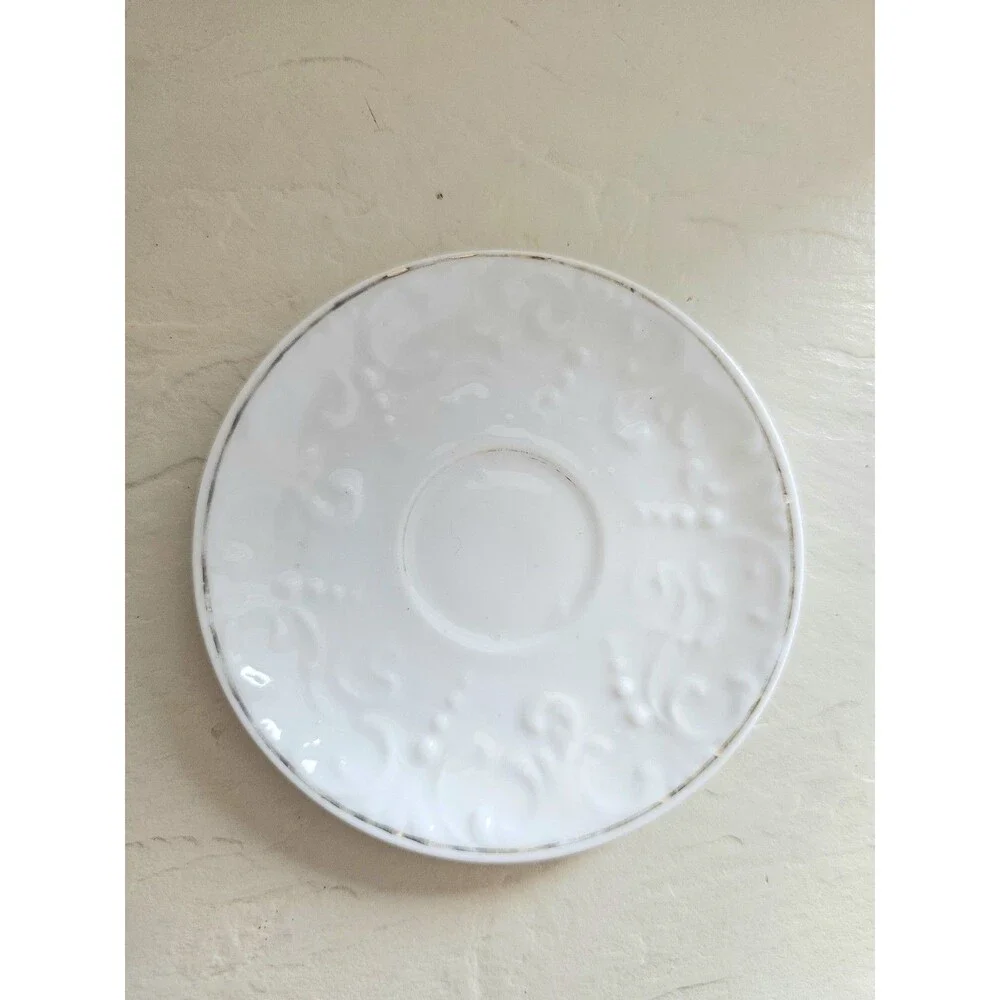 Vintage Miniature White Raised Design Cup And Saucer